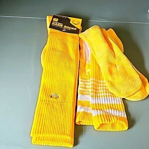 3 pair mens game socks. 2 pair new, 1 pair used. SIZE large. Yellow